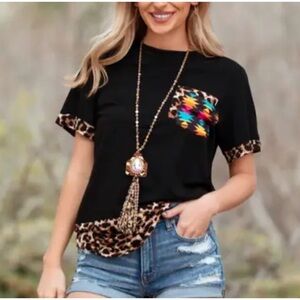 Sunshine & Rodeos black tee with leopard print accents
